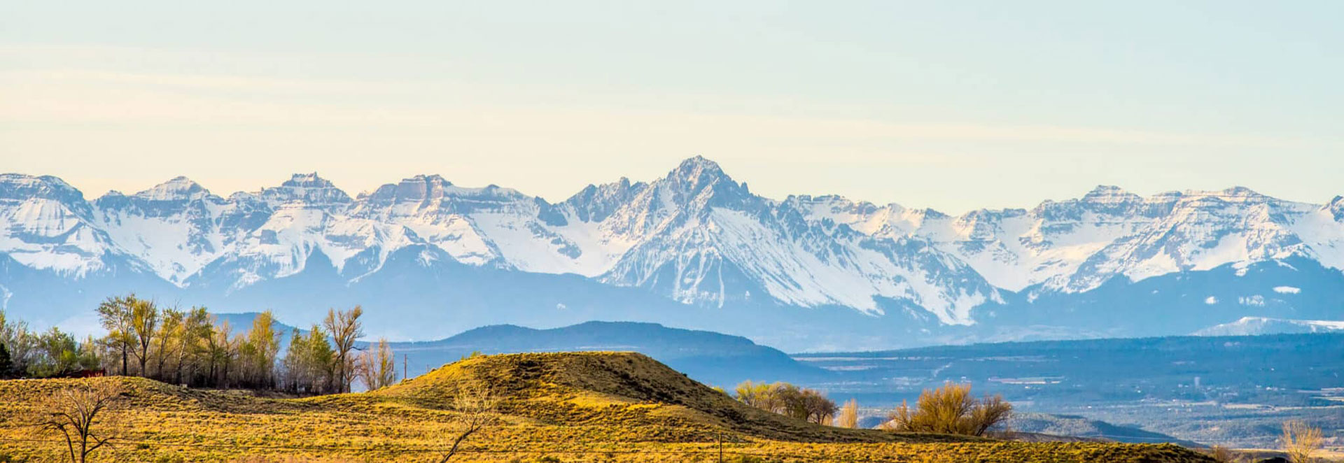 zoomed in shot of snowy, rocky mountain range