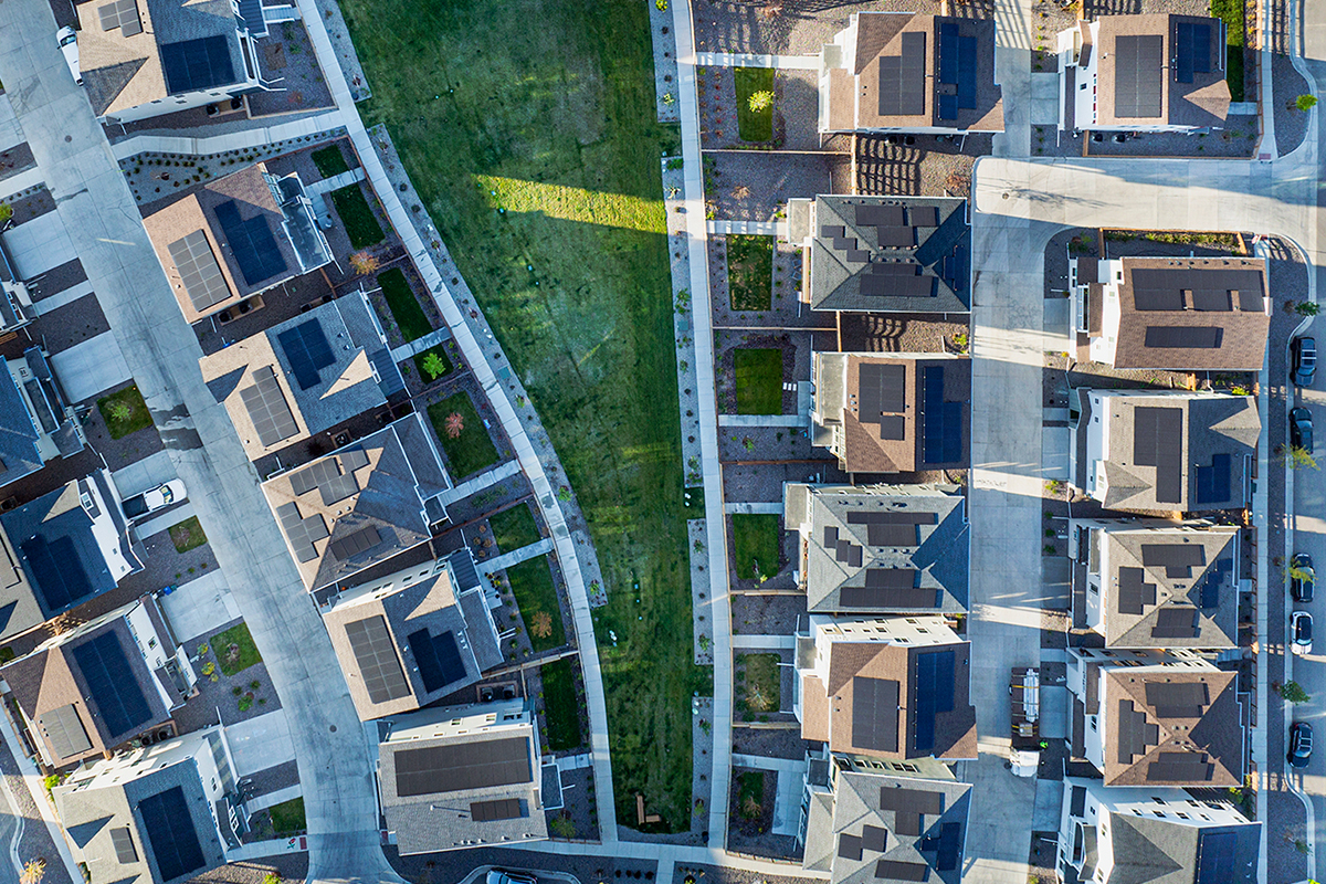 Aerial view of a neighborhood where every home has solar panels